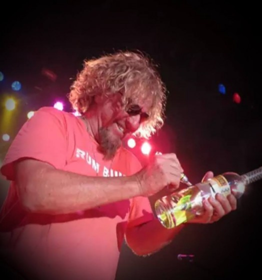 Sammy signing my bottle!