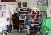 RED ROCKER BIKE IS ON THE ROAD and REINHARDT'S MOTORCYCLES IS IN THE NEW SHOP