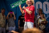 Sammy shows off sign for the new "Hagar Way" that will be built in Fontana