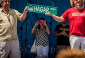 Sammy and brother Bob show off sign for the new "Hagar Way" that will be built in Fontana